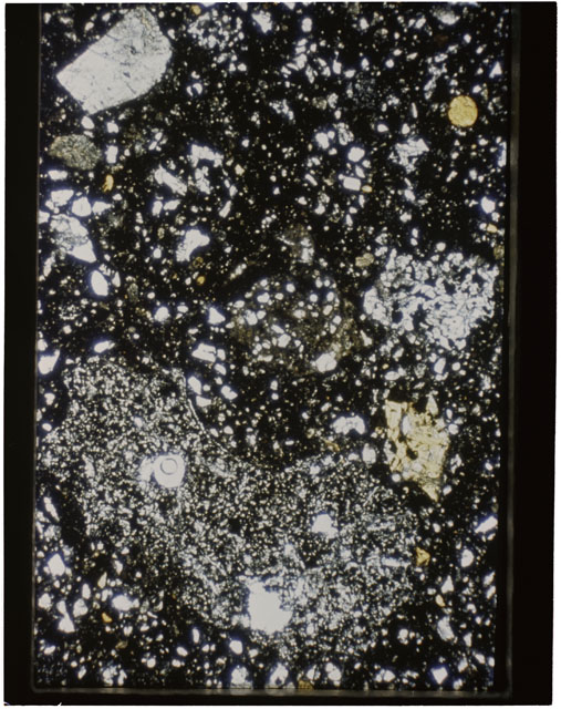 Color photograph of Apollo 11 Sample(s) 10021,28; Thin Section using cross nichols light.