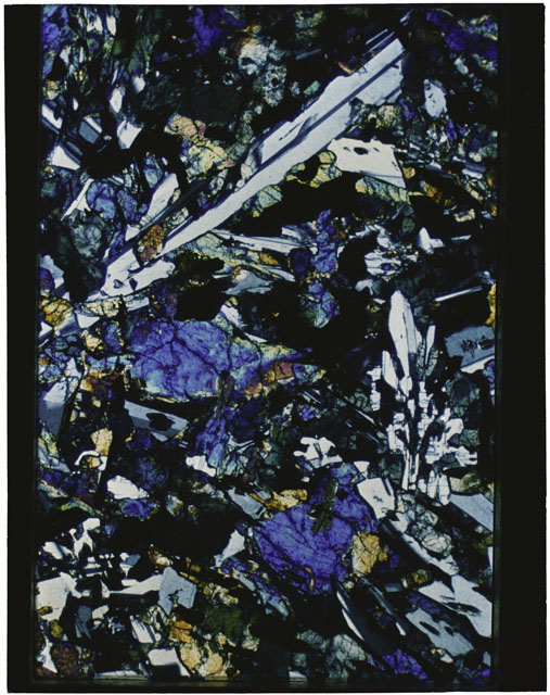 Color Thin Section photograph of Apollo 12 Sample(s) 12063,16 using cross nichols light.