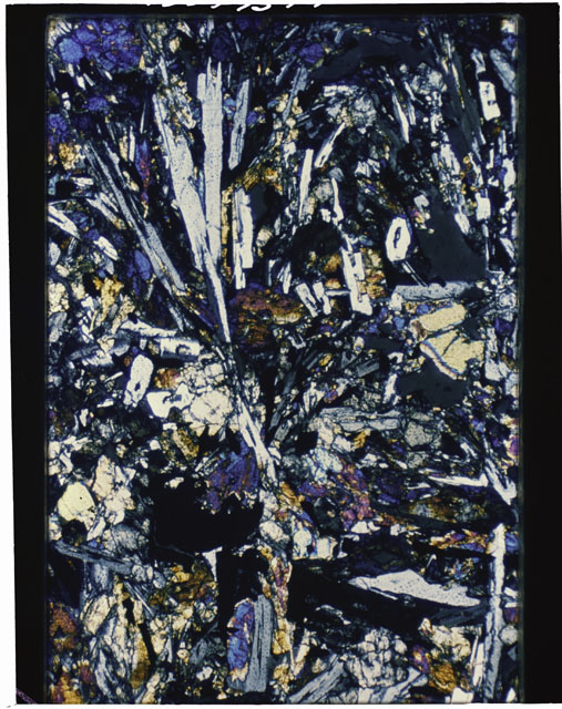 Color Thin Section photograph of Apollo 12 Sample(s) 12002,157 using cross nichols light.