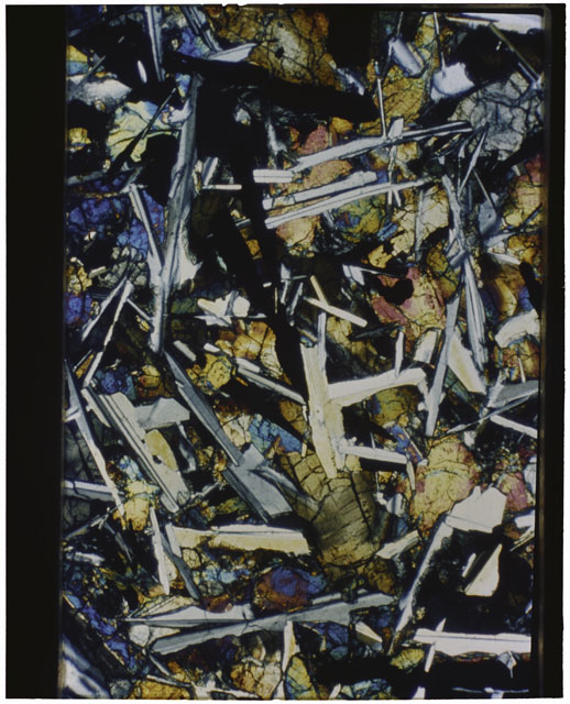 Color Thin Section photograph of Apollo 12 Sample(s) 12047,9 using cross nichols light.