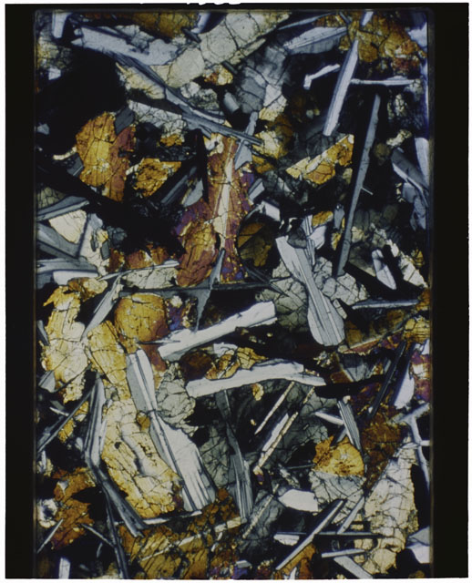 Color Thin Section photograph of Apollo 12 Sample(s) 12051,56 using cross nichols light.