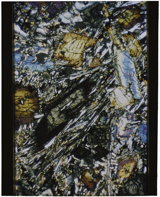 Color mosaic Thin Section photograph of Apollo 12 Sample(s) 12065,92 using cross nichols light.