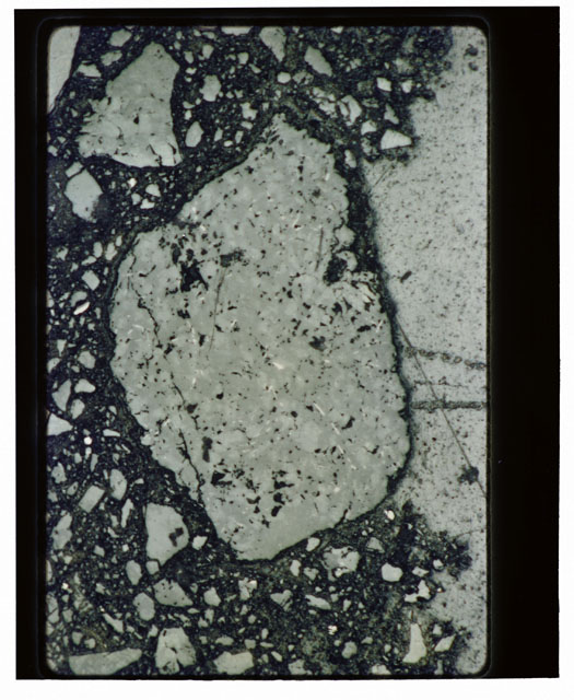 Color Thin Section photograph of Apollo 14 Sample(s) 14307 using transmitted light.