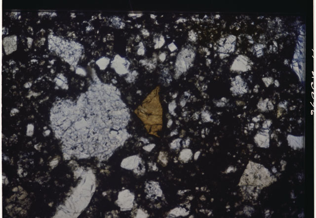 Color Thin Section photograph of Apollo 14 Sample(s) 14307,4 using transmitted light and 10 X magnification.