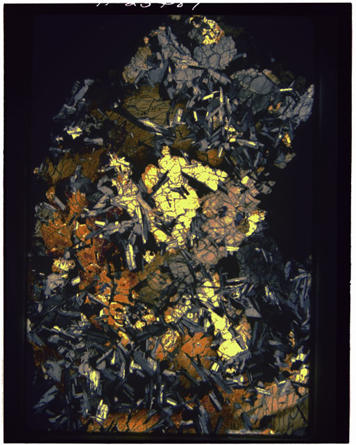 Color Thin Section photograph of Apollo 14 Sample(s) 14053,5 using cross nichols light.