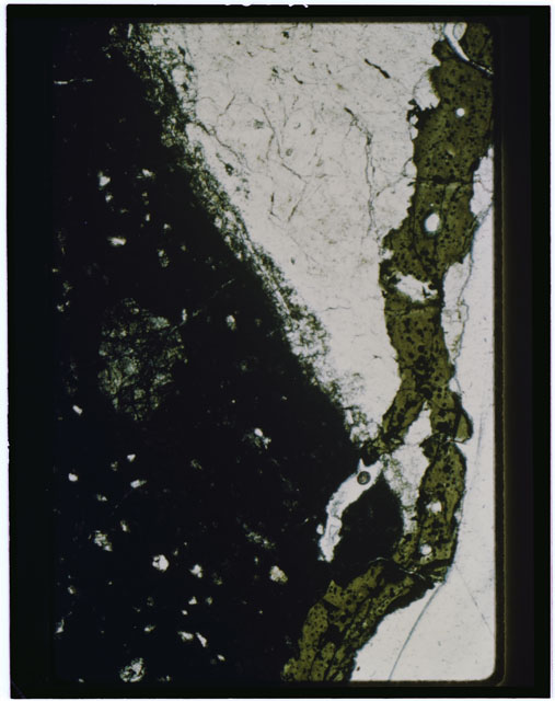 Color Thin Section photograph of Apollo 14 Sample(s) 14306,3 using transmitted light.