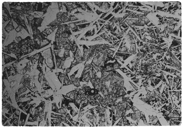 Black and white Thin Section photograph of Apollo 14 Sample(s) 14310,15 using transmitted light.
