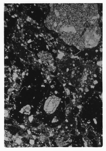 Black and white Thin Section photograph of Apollo 14 Sample(s) 14306,7 using transmitted light.