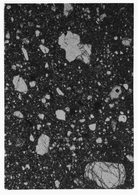 Black and white Thin Section photograph of Apollo 14 Sample(s) 14306,8 using transmitted light.