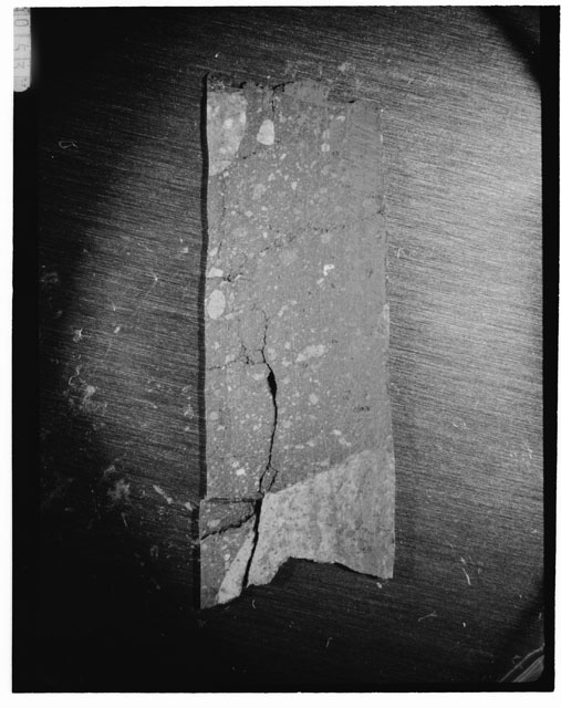 Black and white photograph of Apollo 14 Sample(s) 14307,29; Processing photograph displaying a slab.