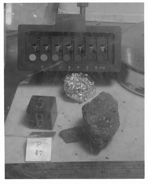 Black and white photograph of Apollo 14 Sample(s) 14311,26,47; Processing photograph displaying post chip sample with an orientation of B,S.