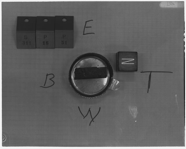 Black and white photograph of Apollo 14 Sample(s) 14311,51; Processing photograph displaying an orientation of N .