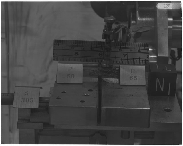 Black and white photograph of Apollo 14 Sample(s) 14305,60,65; Processing photograph displaying cutting with an orientation of T,N.