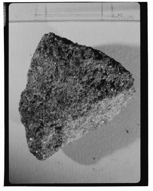 Black and white photograph of Apollo 14 Sample(s) 14072,1; Processing photograph displaying a chip.
