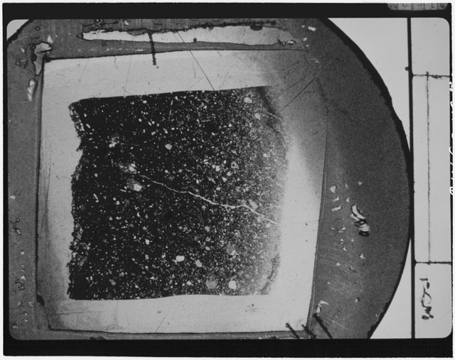 Black and white photograph of Apollo 14 Sample(s) 14307,52; Thin Section photograph displaying a .