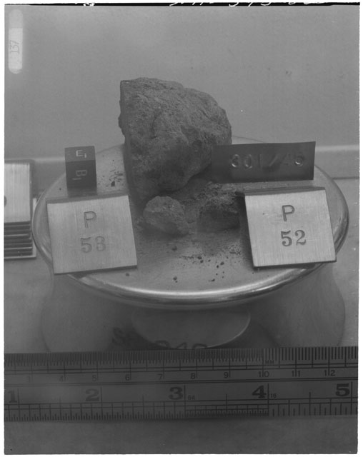 Black and white photograph of Apollo 14 Sample(s) 14301,45,53,52; Processing photograph displaying a post chipping with an orientation of E,B.