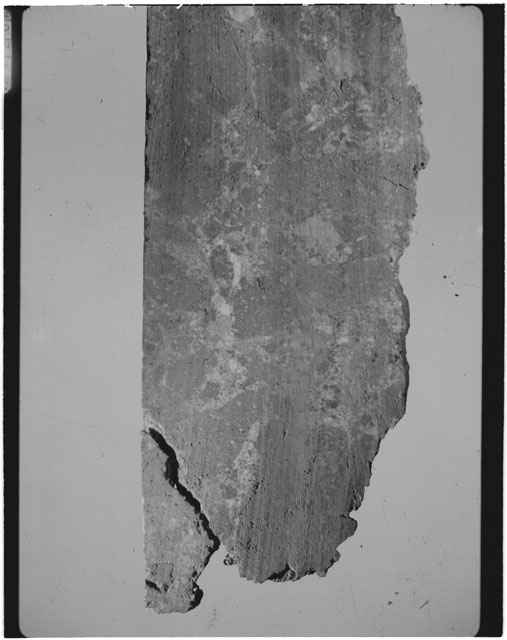 Black and white photograph of Apollo 14 Sample(s) 14306,29; Processing photograph displaying a chip.