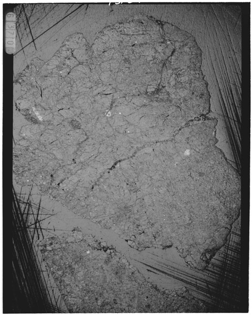 Black and white Thin Section photograph of Apollo 14 Sample(s) 14306,66 using reflective light.