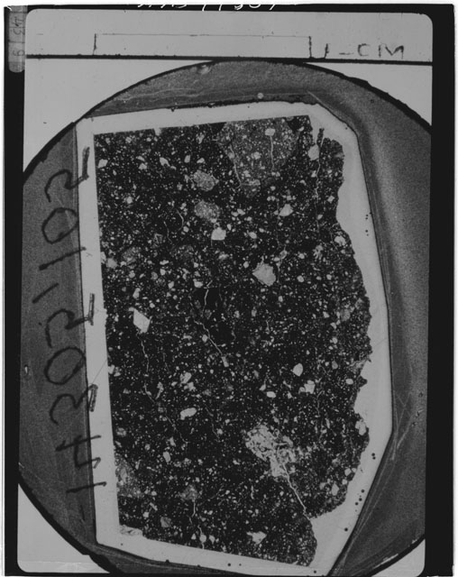 Black and white Thin Section photograph of Apollo 14 Sample(s) 14305,105 using cross nichols light.