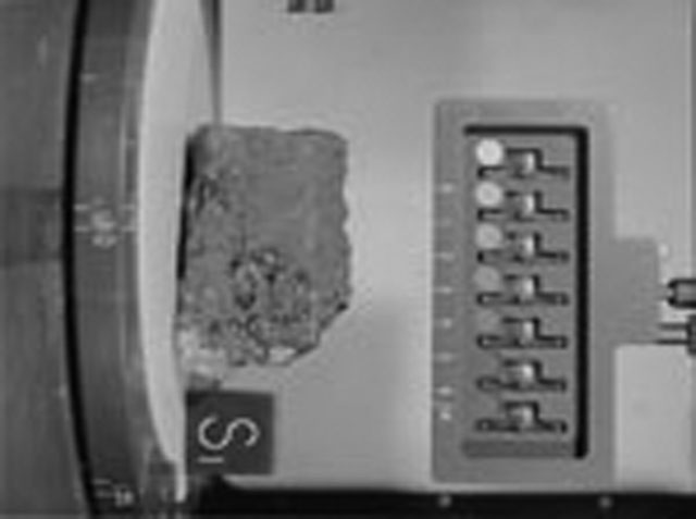Black and White Photograph of Apollo 15 Sample(s) 15205, 0; Stereo photo with orientation 180 degrees, A.
