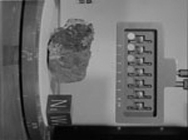 Black and White Photograph of Apollo 15 Sample(s) 15205, 0; Stereo photo with orientation 315 degrees, A.