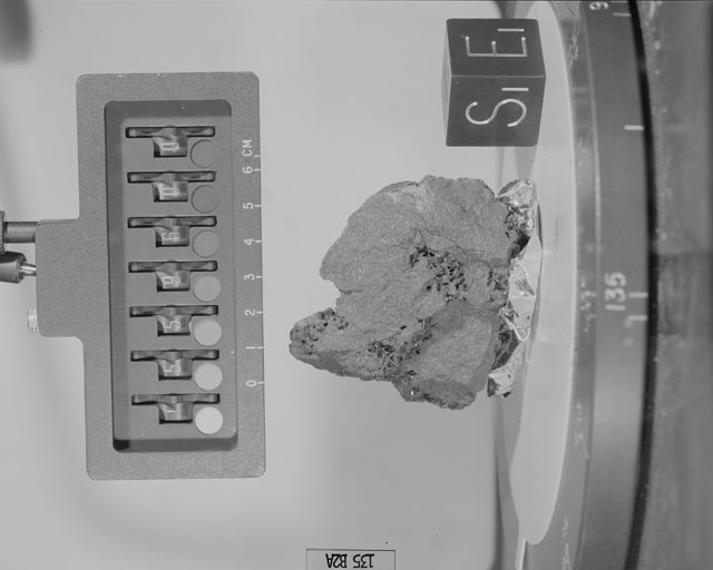 Black and White Photograph of Apollo 15 Sample(s) 15596, 0; Stereo photo with orientation 135 degrees, A.