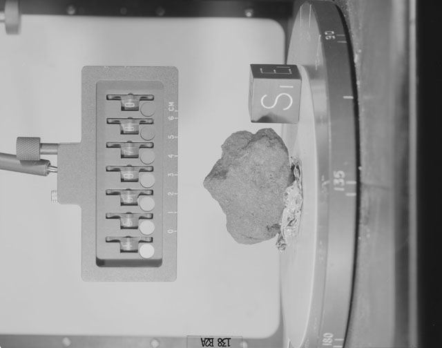 Black and White Photograph of Apollo 15 Sample(s) 15597, 0; Stereo photo with orientation 138 degrees, A.