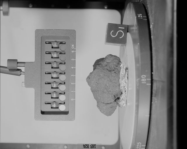 Black and White Photograph of Apollo 15 Sample(s) 15597, 0; Stereo photo with orientation 183 degrees, A.