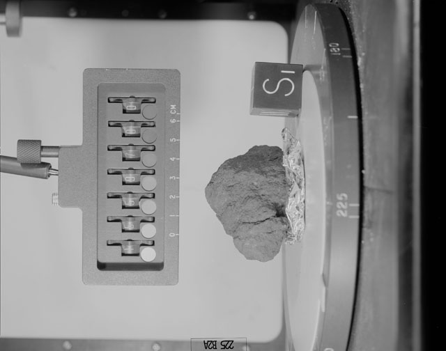 Black and White Photograph of Apollo 15 Sample(s) 15597, 0; Stereo photo with orientation 225 degrees, A.