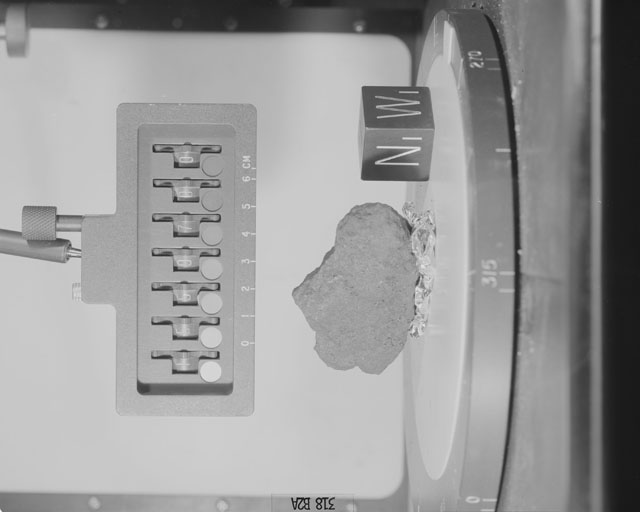 Black and White Photograph of Apollo 15 Sample(s) 15597, 0; Stereo photo with orientation 318 degrees, A.