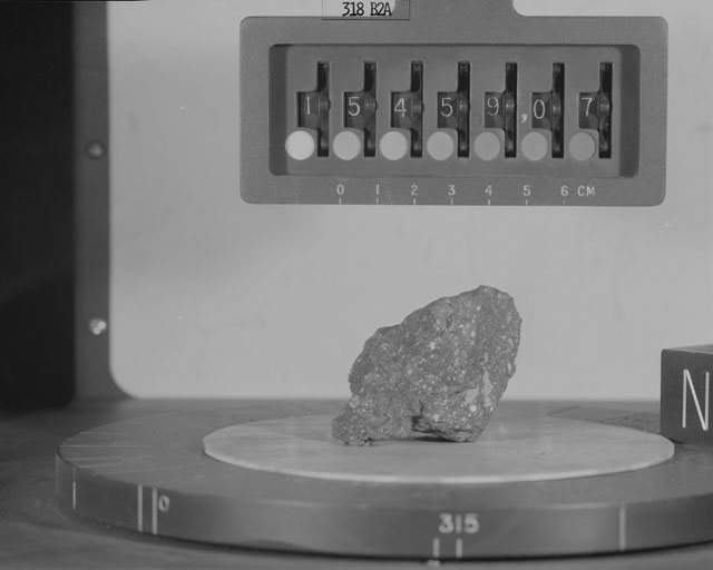 Black and White Photograph of Apollo 15 Sample(s) 15459, 7; Stereo photo with orientation 318 degrees, A.