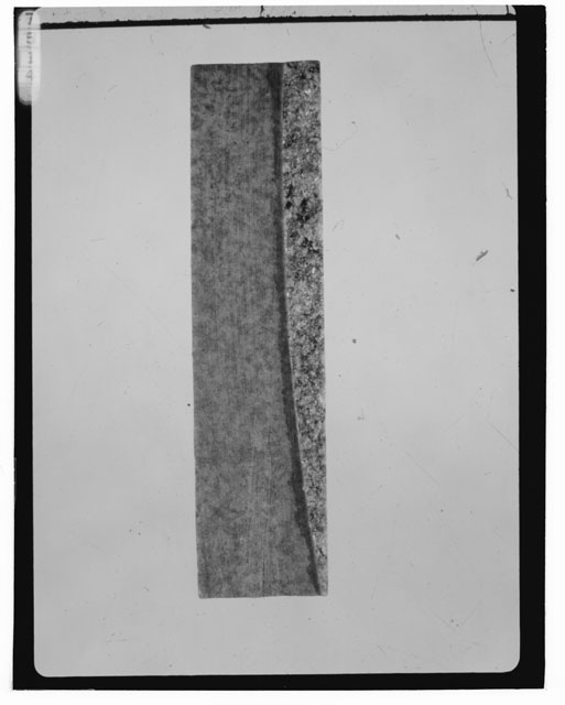 Black and white photograph of Apollo 14 Sample(s) 14310,231; Processing photograph displaying a slab.