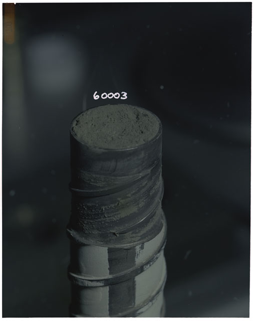 Color photograph of Apollo core tube 60003 in processing lab.