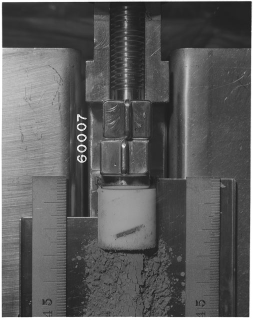 Black and white photograph of Apollo 16 Sample(s) 60007; Processing photograph displaying Core Tube at 45-48 cm depth.