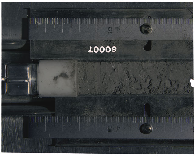 Color photograph of Apollo 16 Sample(s) 60007; Processing photograph displaying Core Tube at 40.5-48 cm depth.