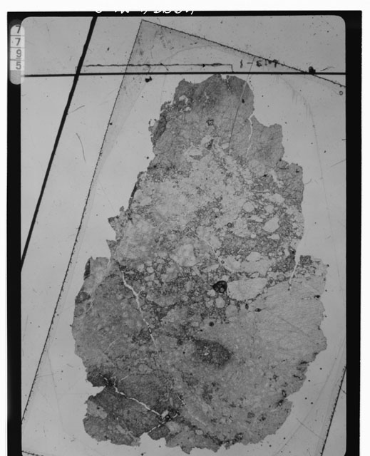Black and white photograph of Apollo 16 Sample(s) 60025,20; Thin Section photograph using transmitted light.