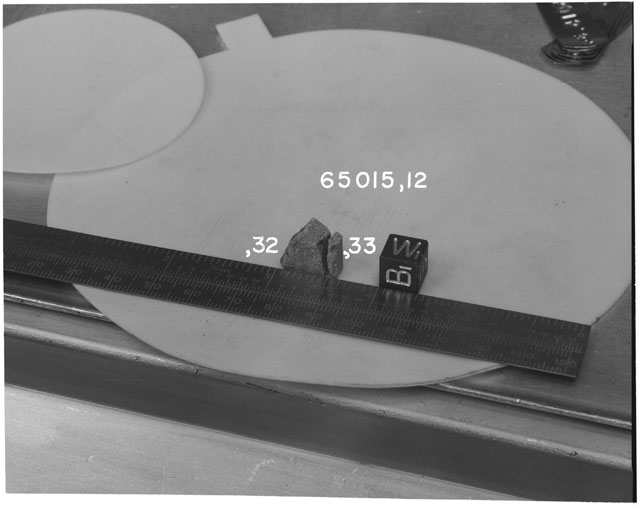 Black and white photograph of Apollo 16 Sample(s) 65015,12,32,33; Processing photograph displaying reconstruction with an orientation of B,W.