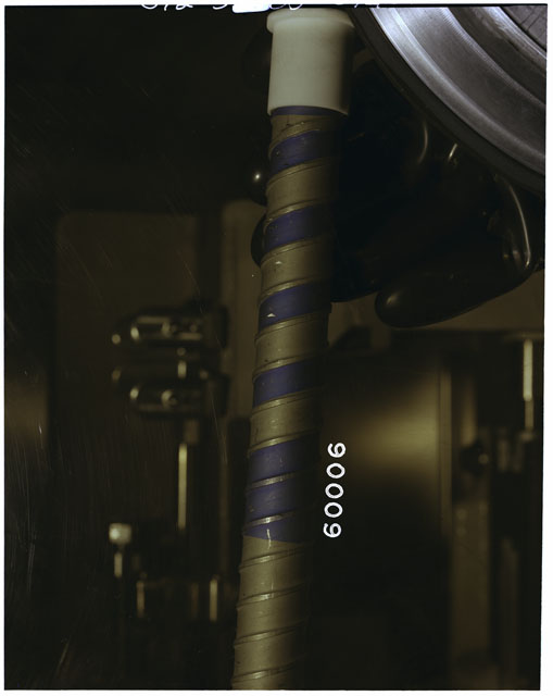 Color photograph of Apollo 16 Sample(s) 60006; Processing photograph displaying Core Tube.