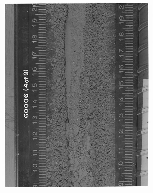 Black and white photograph of Apollo 16 Sample(s) 60006; 4 OF 9 Processing photograph displaying Core Tube at 9-20 cm depth.