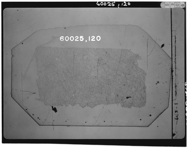 Black and white photograph of Apollo 16 Sample(s) 60025,120; Thin Section photograph using transmitted light.