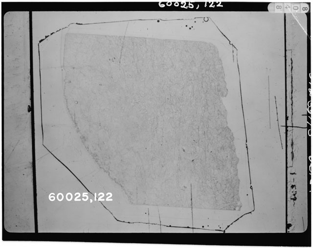 Black and white photograph of Apollo 16 Sample(s) 60025,111; Thin Section photograph using transmitted light.