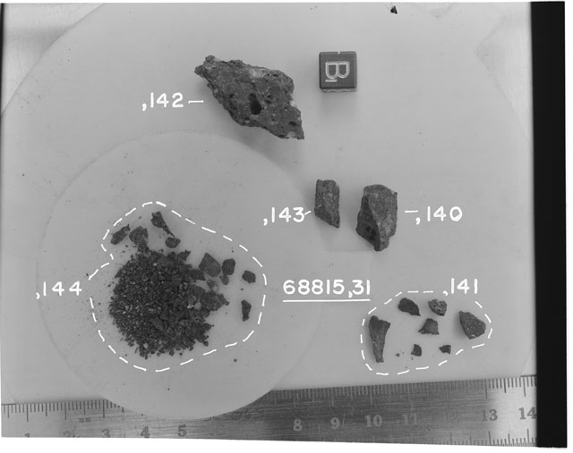 Black and white photograph of Apollo 16 Sample(s) 68815,31,140-144; Processing photograph displaying chips, fragments and fines with an orientation of B.