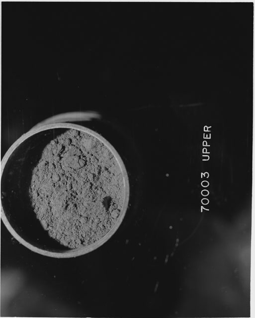 Black and white photograph of Apollo 17 Sample(s) 70003; Processing photograph displaying the upper end of Core Tube.
