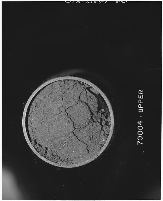 Black and white photograph of Apollo 17 Sample(s) 70004; Processing photograph displaying the upper end of Core Tube.