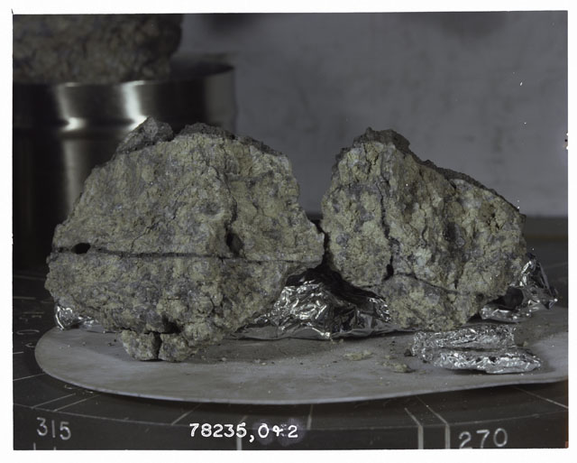 Color photograph of Apollo 17 Sample(s) 78235,0,2; Processing photograph displaying reconstruction.