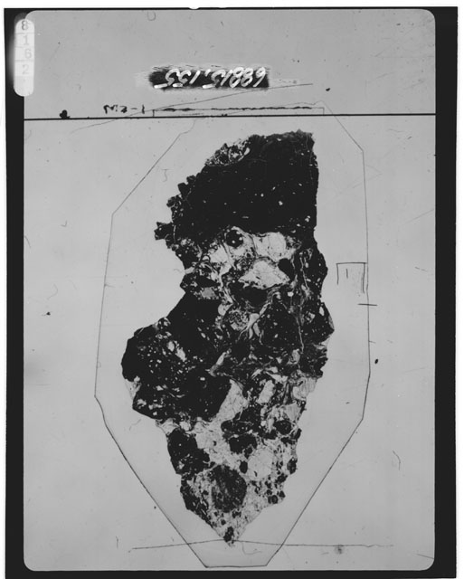 Black and white photograph of Apollo 16 Sample(s) 68815,155; Thin Section photograph using transmitted light.