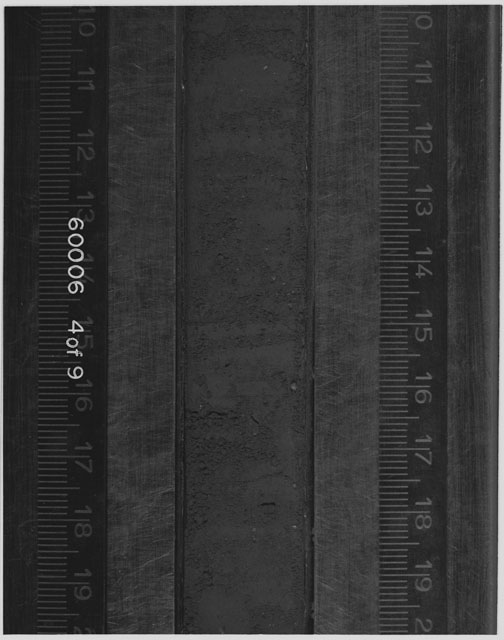 Black and white photograph of Apollo 16 Sample(s) 60006; 4 OF 9 Processing photograph displaying Core Tube at 10-19.5 cm depth.