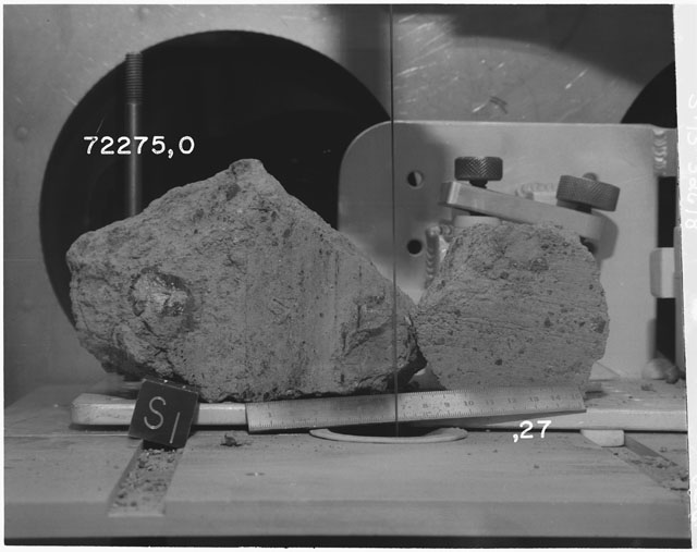 Black and white photograph of Apollo 17 Sample(s)72275,0,27; Processing photograph displaying post saw slab with an orientation of S.