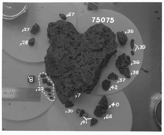 Black and white photograph of Apollo 17 Sample(s) 75075,7,22,27-8,30,35-42,67; Processing photograph displaying reconstruction.