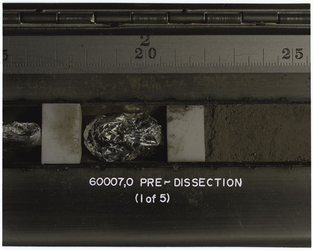 Color photograph of Apollo 16 Sample(s) 60007,0; 1 OF 5 Processing photograph displaying post dissection Core Tube .